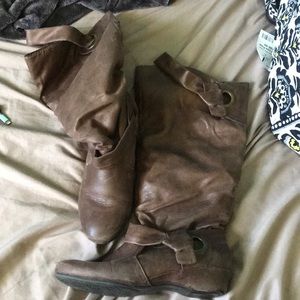 Worn brown boots
